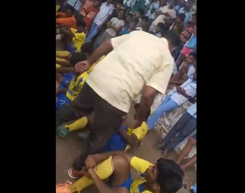 A screenshot from the viral video showing physical education teacher Annamalai assaulting students, which led to his suspension following an investigation in Salem, Tamil Nadu.