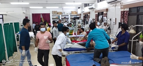 Health workers treating patients in overcrowded Bilaspur health centers as diarrhea and malaria cases surge. Collector Avnish Sharan inspecting rural areas affected by the outbreak, emphasizing the need for urgent health and infrastructure improvements.