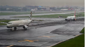 Heavy rains in Mumbai cause the cancellation of 36 flights and diversion of several others, impacting road and rail services.